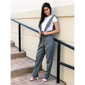 Belted button fly pants with ruffle straps